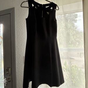 Black cocktail dress with chest cut outs